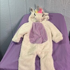 Adorable Unicorn Costume with Purple Accents